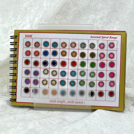 Bindi Book with gold stone work in round shape in various different sizes and colours. Prefect for Indian weddings, parties and special occasions.