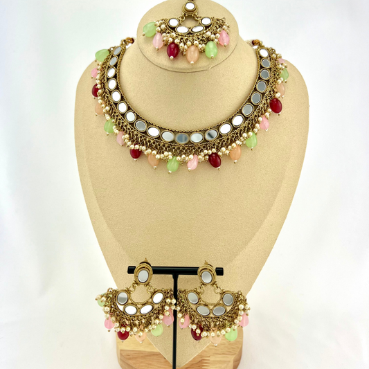 Mirror necklace set with multi colour beads and small white pearls.  Set includes necklace, tikka and earrings.  Prefect for Indian parties, weddings and special occasions.   Latest 2022 fashion.