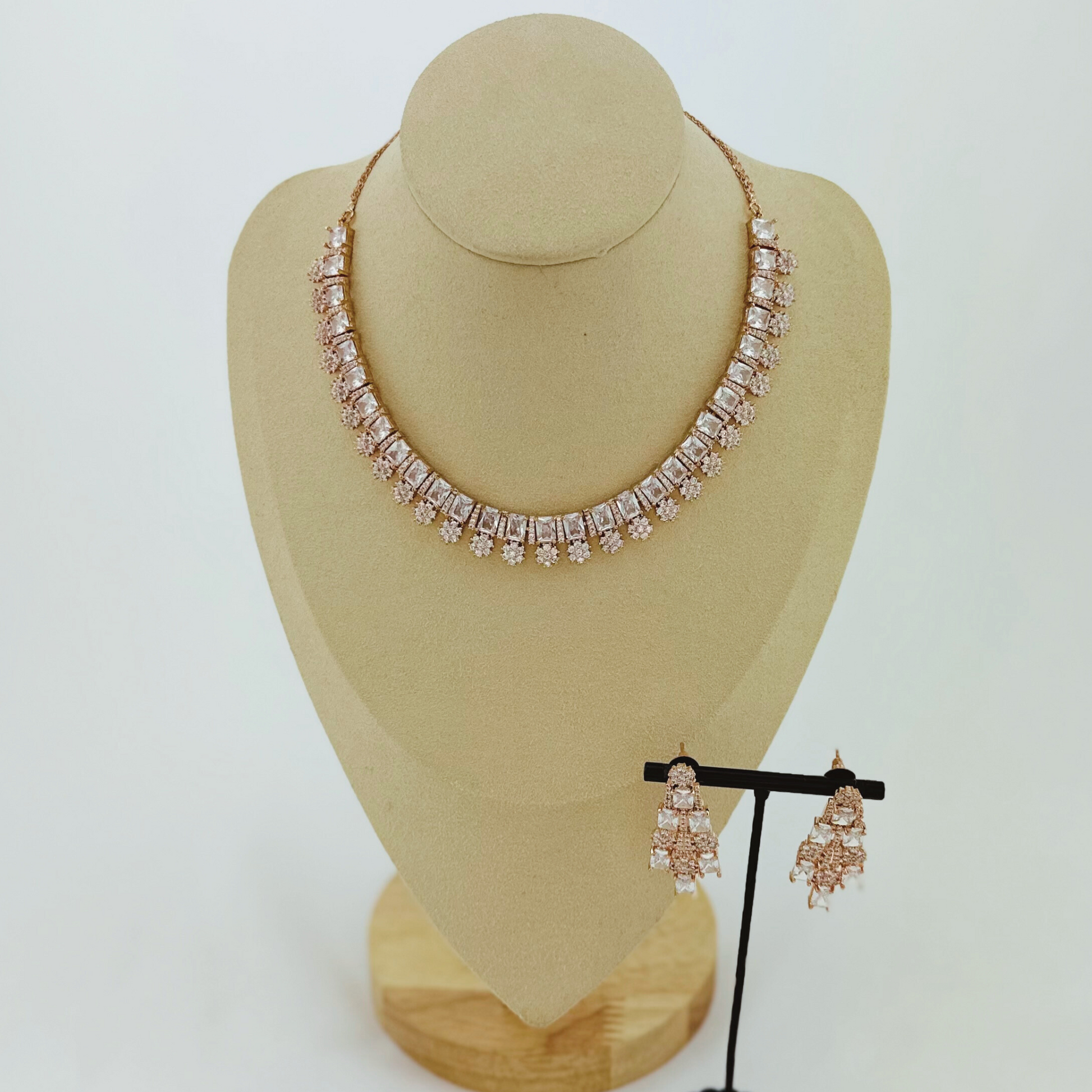 Necklace set with clear white stones.  Set includes necklace & earrings.  Prefect for Indian parties, weddings and special occasions.   Latest 2023 fashion.