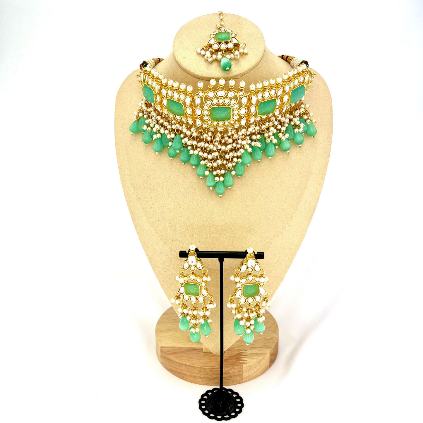 Necklace set with turquoise beads and stones, finished with small white pearls.  Set includes necklace, tikka and earrings.  Prefect for Indian weddings, parties and special occasions.  Latest 2022 fashion. High end Indian fashion jewellery with top quality stones and beads.