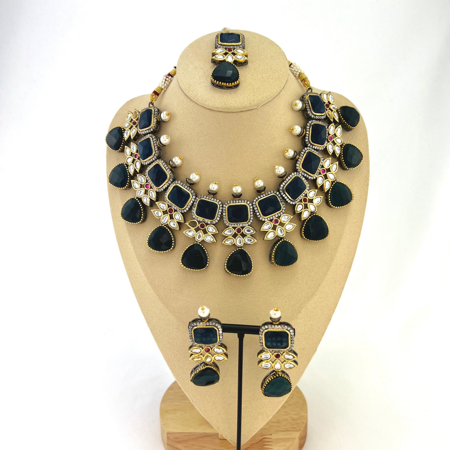 Necklace set with Navy and silver stone work finished with small white pearls.  Set includes necklace, tikka and earrings.  Prefect for Indian parties, weddings and special occasions.   Latest 2022 fashion 