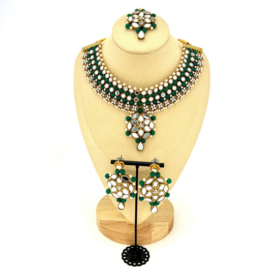 Mirror necklace set with forest green beads, clear stones and pearls.  Set includes, necklace, tikka and earrings.  Prefect for Indian weddings, parties and special occasions.  Latest 2022 fashion. High end Indian fashion jewellery with top quality stones and beads.