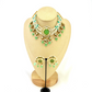 Necklace set with green beads, stones and white pearl.  Set includes necklace and earrings.  Prefect for Indian weddings, parties and special occasions.   Latest 2022 fashion. High end Indian fashion jewellery with top quality stones and beads.