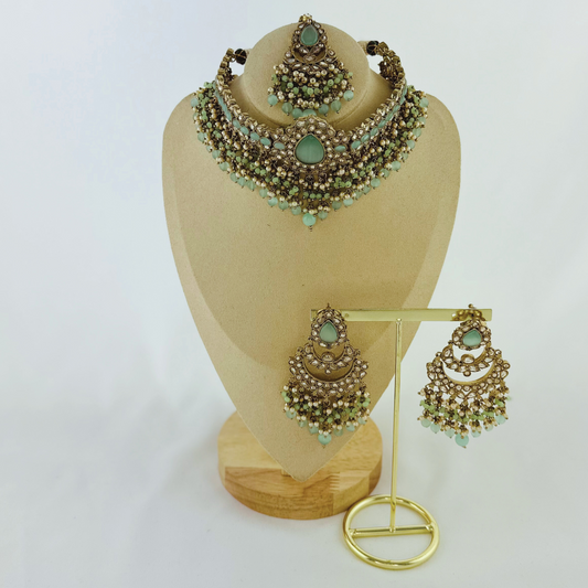 Choker set with aqua blue stones pearl beads.  Set includes necklace, tikka & earrings.  Prefect for Indian weddings, parties and special occasions.   Latest 2023 fashion. High end Indian fashion jewellery with top quality stones and beads.