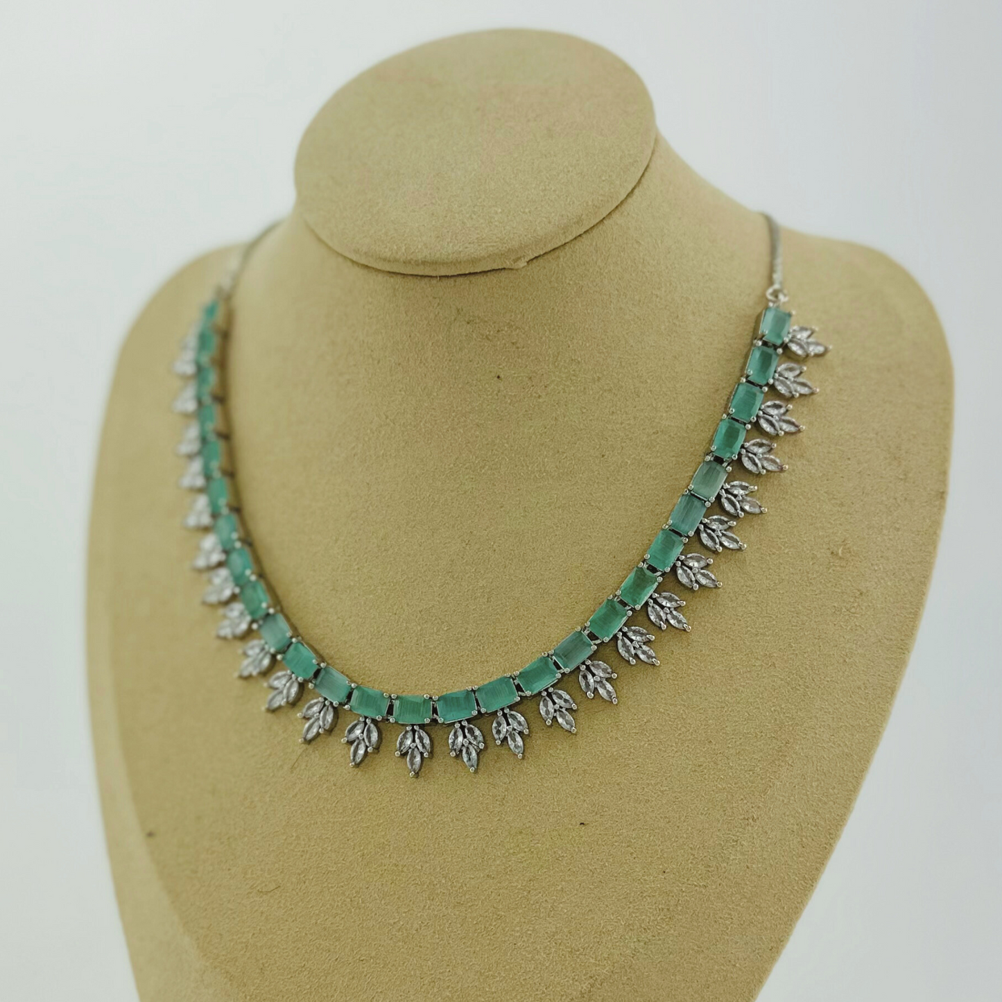 Necklace set with light blue and clear stones.  Set includes necklace & earrings.  Prefect for Indian weddings, parties and special occasions.   Latest 2023 fashion. High end Indian fashion jewellery with top quality stones and beads.