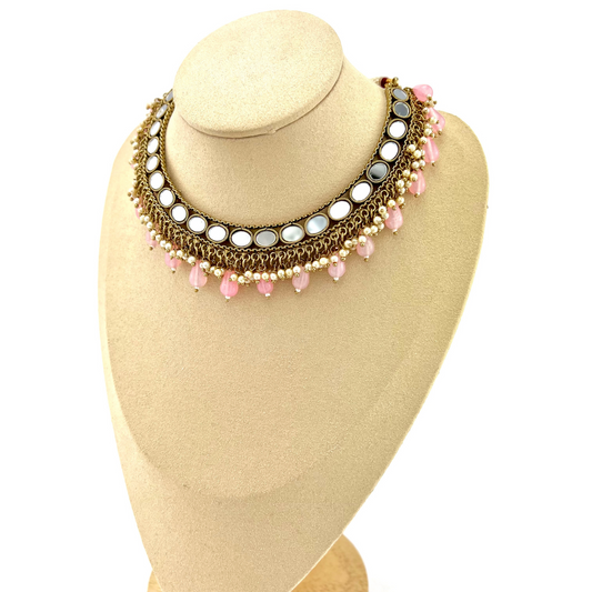 Mirror necklace set with pink beads and small white pearls.  Set includes necklace, tikka and earrings.  Prefect for Indian parties, weddings and special occasions.   Latest 2022 fashion.