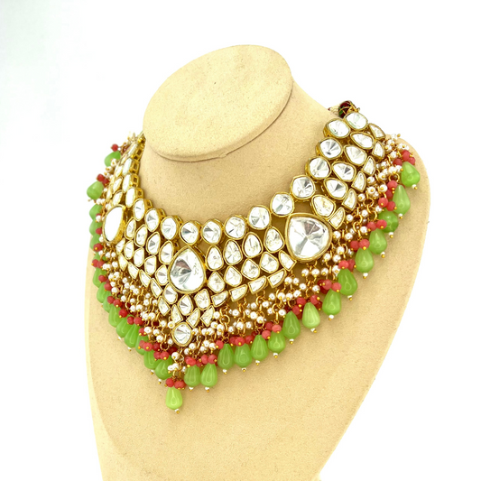 Kundan necklace set with with clear stones, green and pink beads.  Set includes necklace and earrings.  Prefect for Indian weddings, parties and special occasions.  Latest 2022 fashion. High end Indian fashion jewellery with top quality stones and beads.