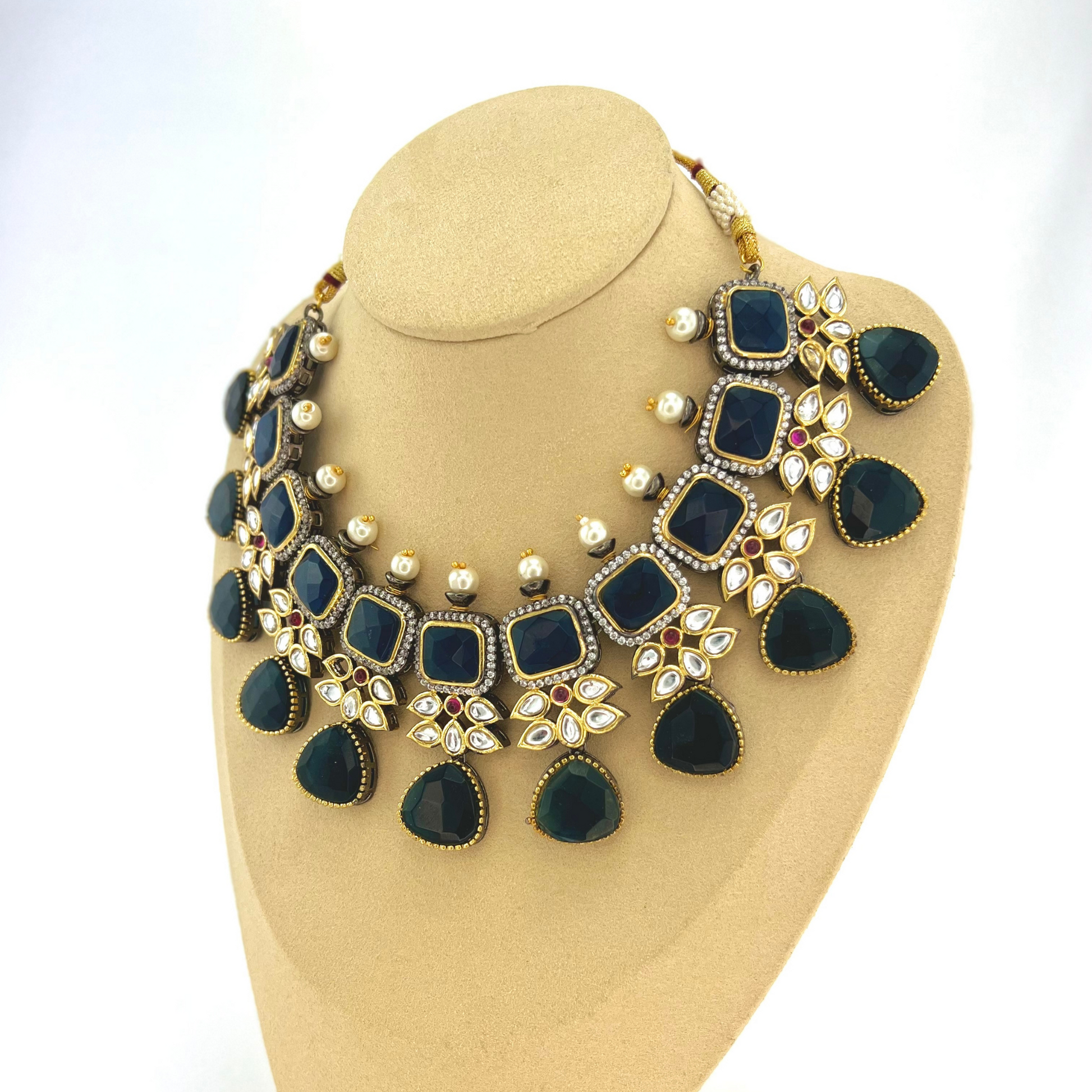 Necklace set with Navy and silver stone work finished with small white pearls.  Set includes necklace, tikka and earrings.  Prefect for Indian parties, weddings and special occasions.   Latest 2022 fashion 