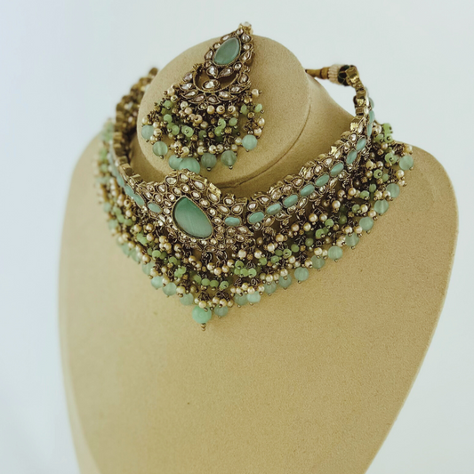 Choker set with aqua blue stones pearl beads.  Set includes necklace, tikka & earrings.  Prefect for Indian weddings, parties and special occasions.   Latest 2023 fashion. High end Indian fashion jewellery with top quality stones and beads.