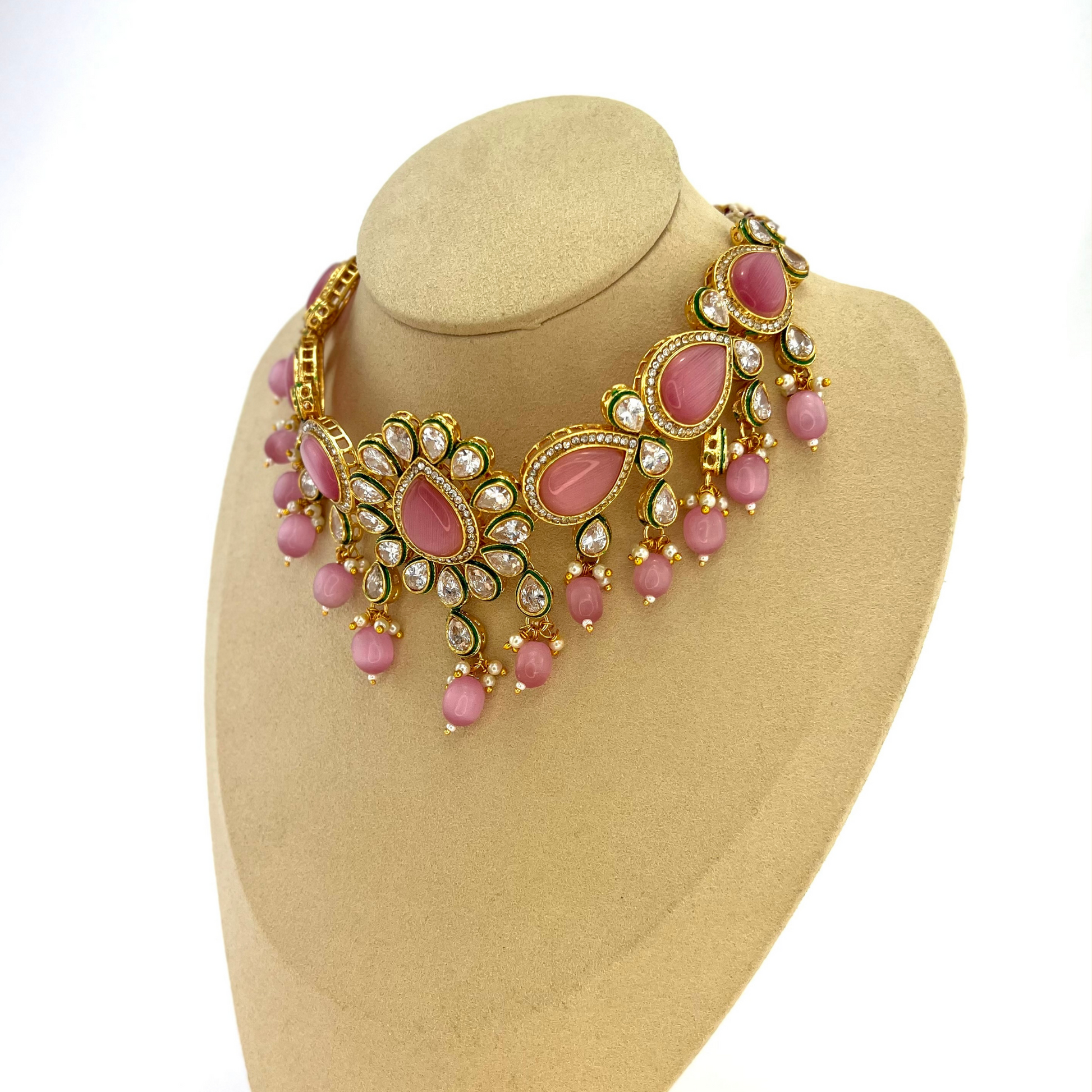 ﻿Choker set with pink, clear stones and pink beads.  Set includes choker, tikka and earrings.  Prefect for Indian weddings, parties and special occasions.  Latest 2022 fashion. High end Indian fashion jewellery with top quality stones and beads.