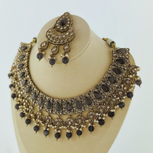 Necklace set with grey beads and stone.  Set includes necklace, tikka & earrings.  Prefect for Indian weddings, parties and special occasions.   Latest 2023 fashion. High end Indian fashion jewellery with top quality stones and beads.