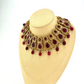 ﻿Necklace set with maroon and gold stone work and maroon beads.  Set includes necklace, tikka and earrings.  Prefect for Indian weddings, parties and special occasions.  Latest 2022 fashion. High end Indian fashion jewellery with top quality stones and beads.