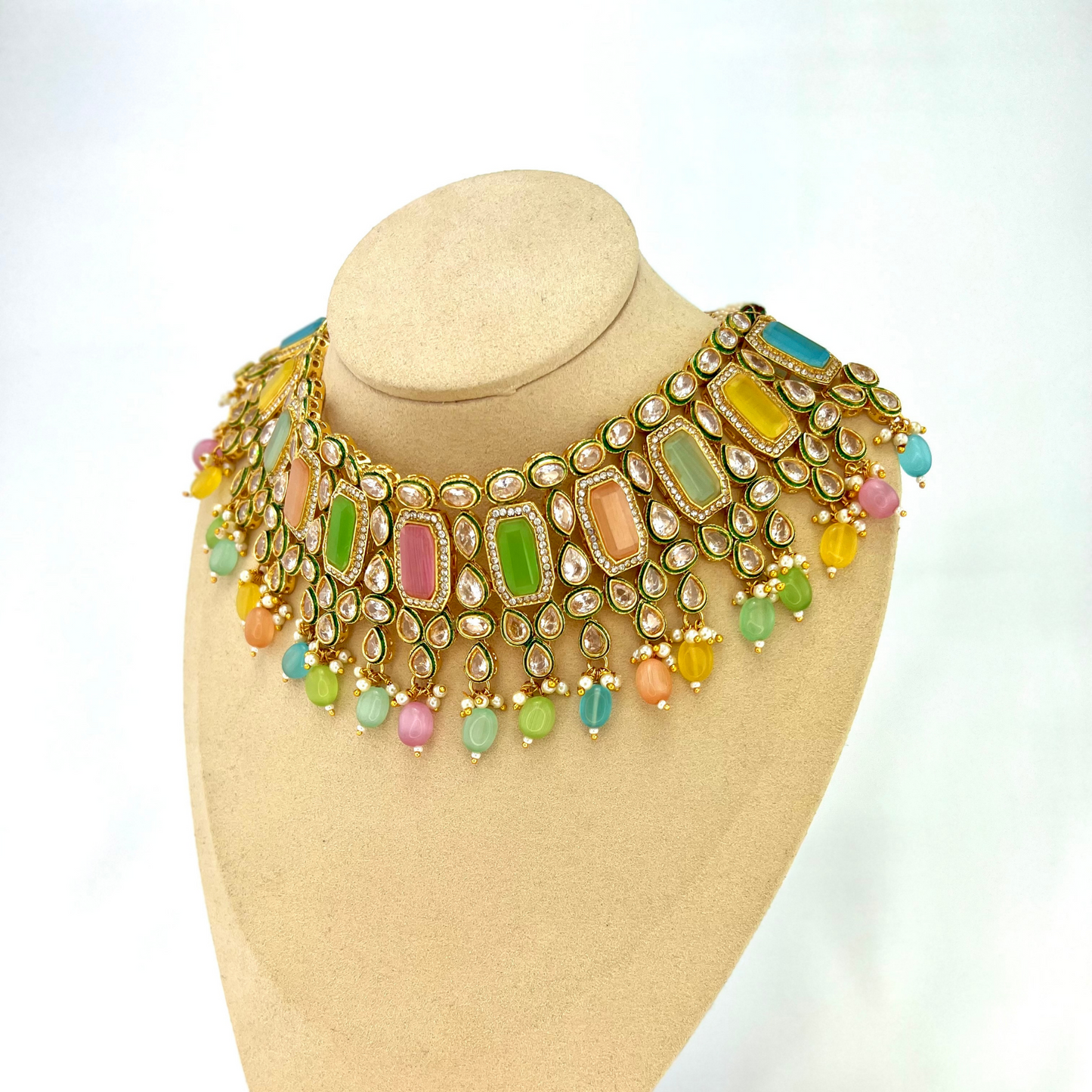 Necklace set with multi colour beads and stones.  Set includes necklace, tikka and earrings.  Prefect for Indian weddings, parties and special occasions.  Latest 2022 fashion. High end Indian fashion jewellery with top quality stones and beads.