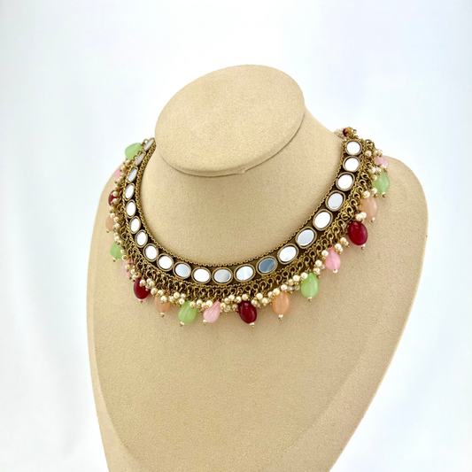 Mirror necklace set with multi colour beads and small white pearls.  Set includes necklace, tikka and earrings.  Prefect for Indian parties, weddings and special occasions.   Latest 2022 fashion.