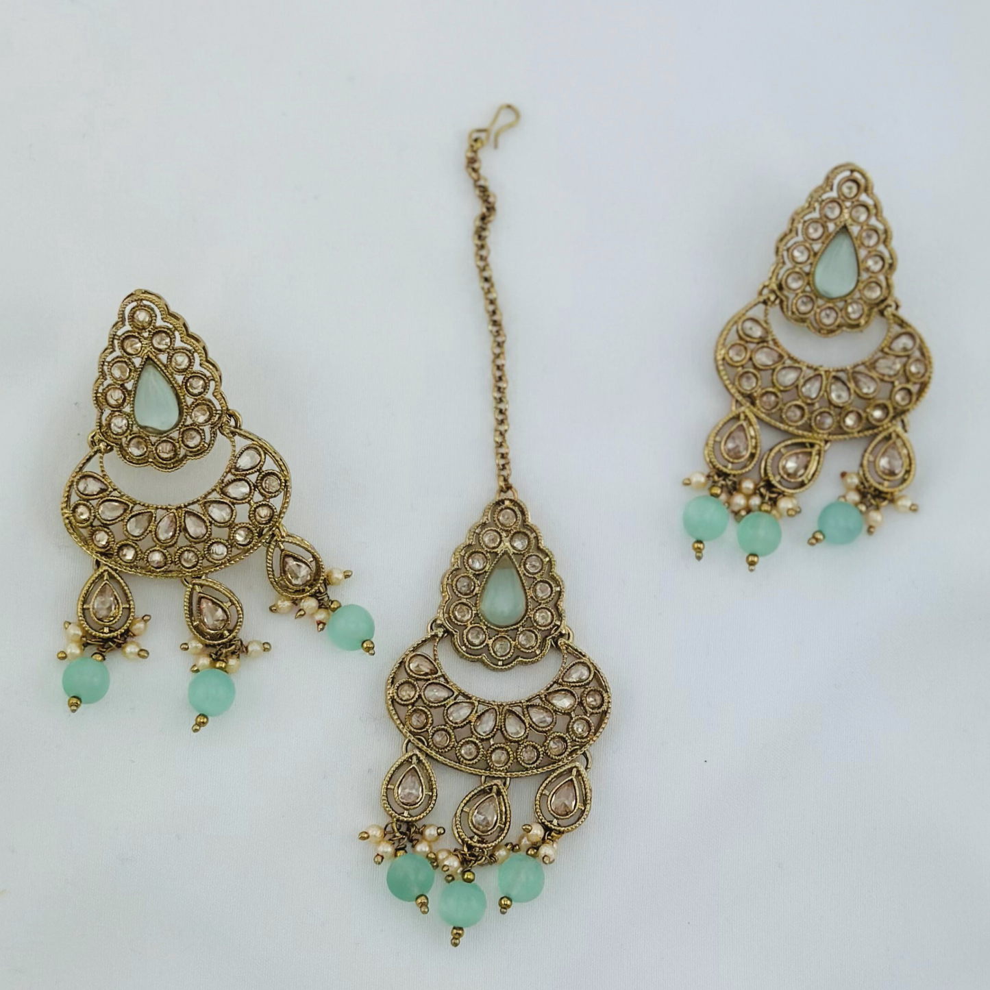 Necklace set with light blue beads and stone.  Set includes necklace, tikka & earrings.  Prefect for Indian weddings, parties and special occasions.   Latest 2023 fashion. High end Indian fashion jewellery with top quality stones and beads.