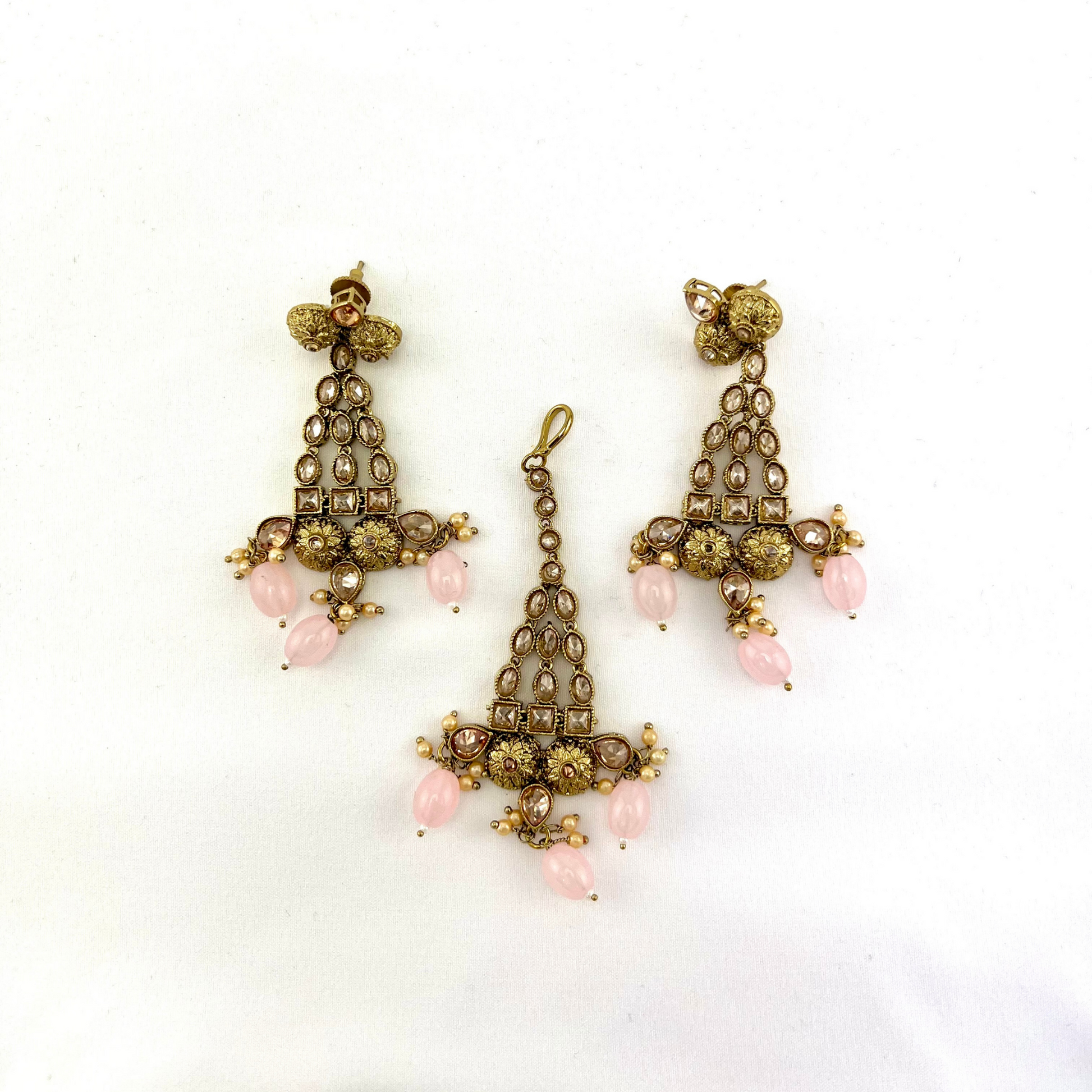 Necklace set with pink  beads and gold stone work.  Set includes necklace, tikka and earrings.  Prefect for Indian weddings, parties and special occasions.   Latest 2022 fashion. High end Indian fashion jewellery with top quality stones and beads.