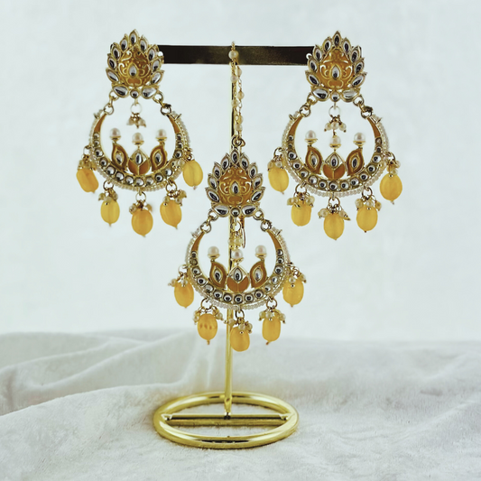 Tikka & Earring Set in yellow.  High quality beads, pearls and stone work.   Latest 2023 fashion for weddings, parties and special occasions 