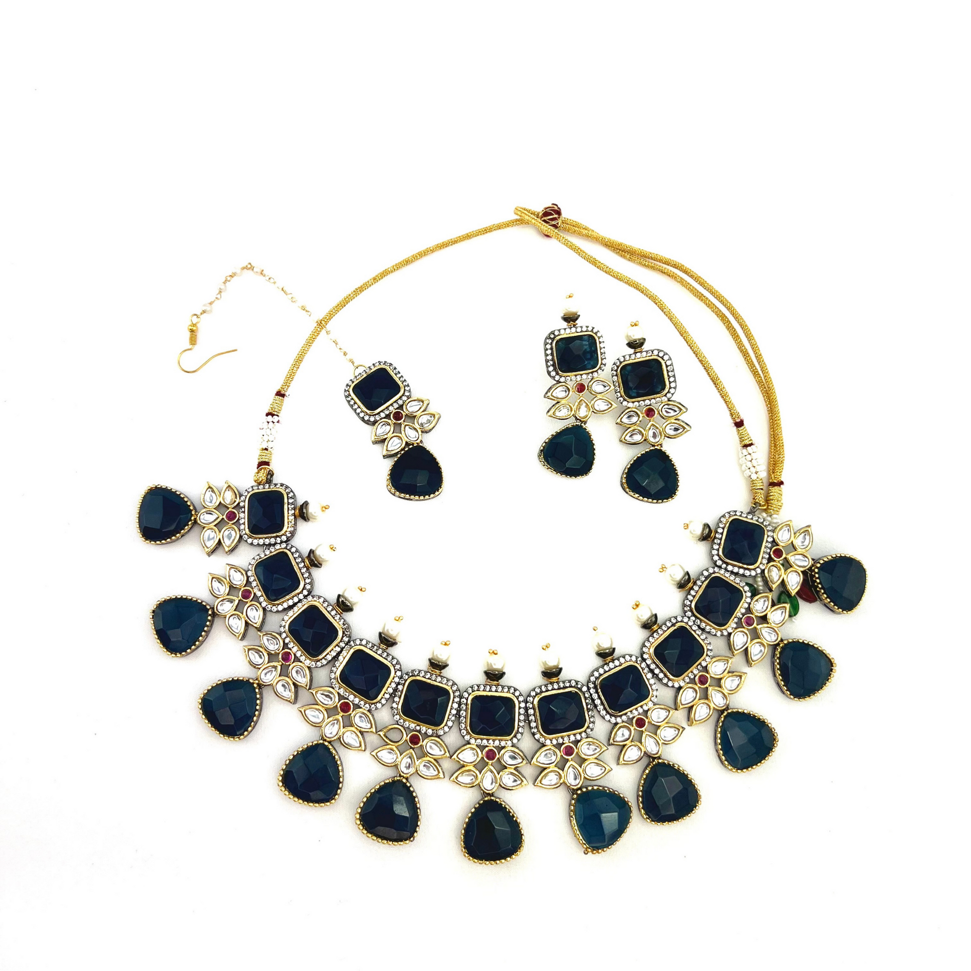 Necklace set with Navy and silver stone work finished with small white pearls.  Set includes necklace, tikka and earrings.  Prefect for Indian parties, weddings and special occasions.   Latest 2022 fashion 