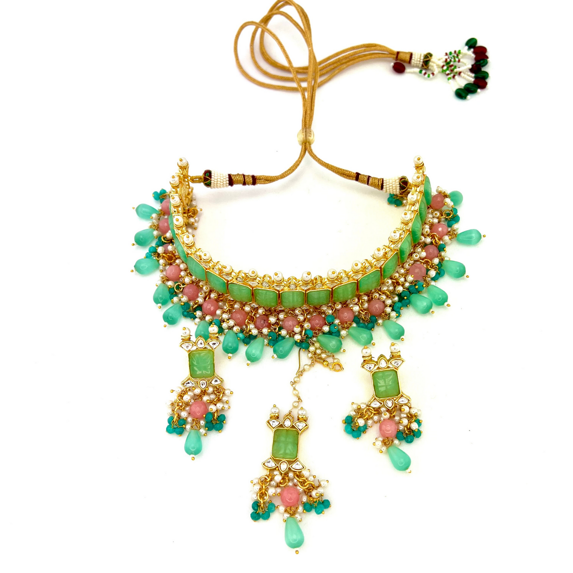 ﻿Choker set with with green, clear stones and pink and blue beads.  Set includes choker, tikka and earrings.  Prefect for Indian weddings, parties and special occasions.  Latest 2022 fashion. High end Indian fashion jewellery with top quality stones and beads.