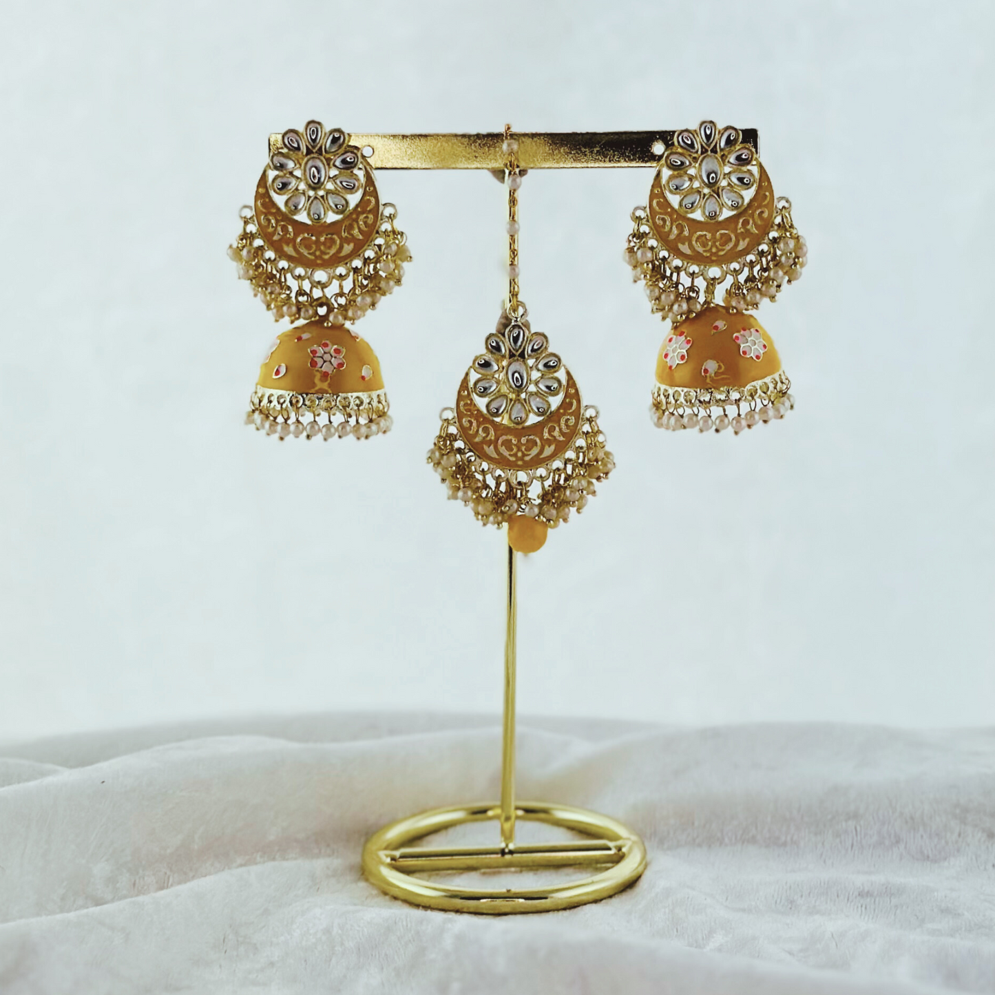 Tikka & Earring Set in yellow.  High quality beads, pearls and stone work.   Latest 2023 fashion for weddings, parties and special occasions 